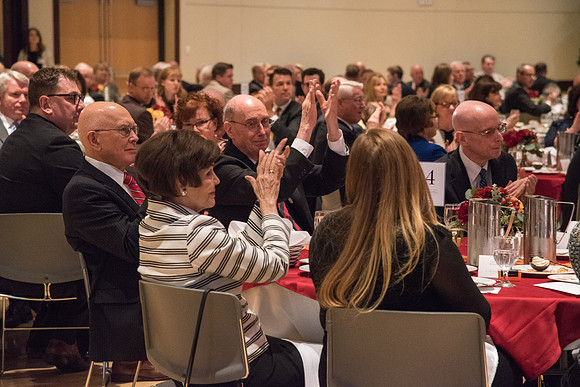 President Henry B. Eyring, Elder Dallin H. Oaks, Sister Kristen M. Oaks, and President Henry J. Eyring enjoy the BYUI Vocal Union while they sing at the Inauguration Luncheon held in the MC Ballroom.