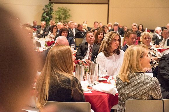 Sister Kelly C. Eyring is touched as Elder David A. Bednar gives her thanks at the Inauguration Luncheon held in the MC Ballroom.