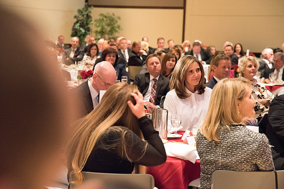 Sister Kelly C. Eyring is touched as Elder David A. Bednar gives her thanks at the Inauguration Luncheon held in the MC Ballroom.