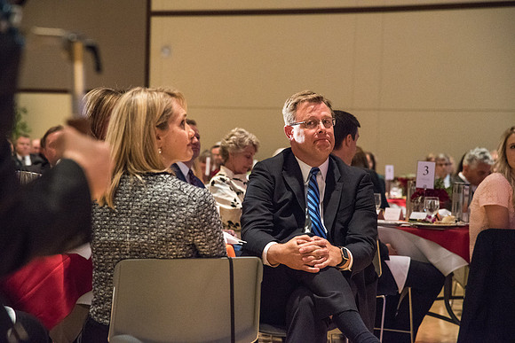 President Clark G. Gilbert is touched as Elder David A. Bednar speaks to and gives thanks to the wives of the Presidents at the Inauguration Luncheon held in the MC Ballroom.