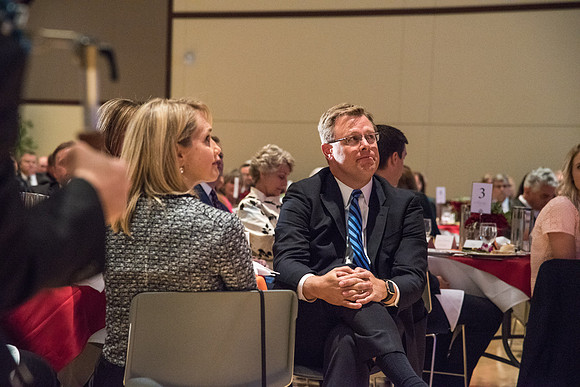 President Clark G. Gilbert is touched as Elder David A. Bednar speaks to and gives thanks to the wives of the Presidents at the Inauguration Luncheon held in the MC Ballroom.