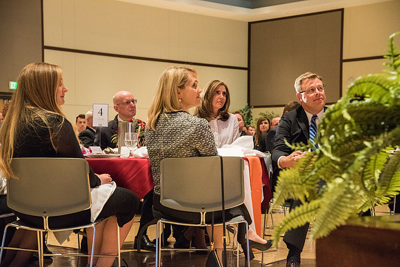 President Henry J. Eyring and President Clark G. Gilbert are touched as Elder David A. Bednar speaks to and gives thanks to the wives of the Presidents at the Inauguration Luncheon held in the MC Ball