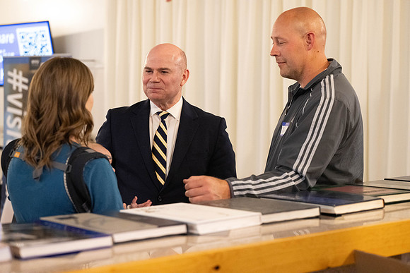 Alumni in the Cache Valley area gather at Eagles Landing Event Center, in Smithfield, Utah and get the chance to listen to and meet President Meredith.