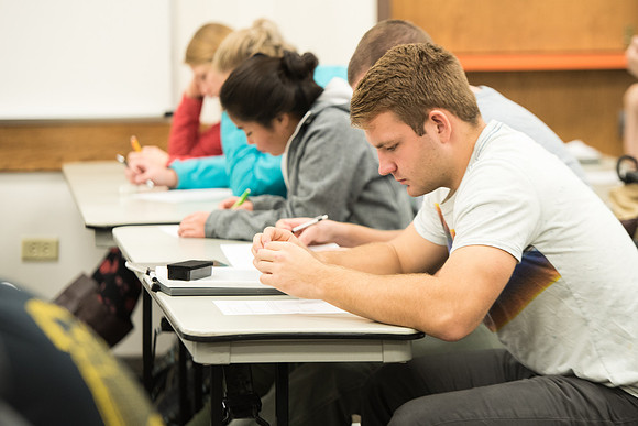 Todd Kelson teaches Biology students about Genetics and Molecular Biology.