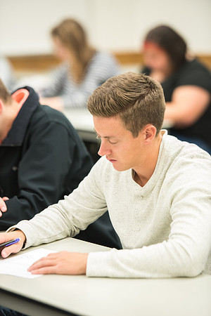 Todd Kelson teaches Biology students about Genetics and Molecular Biology.