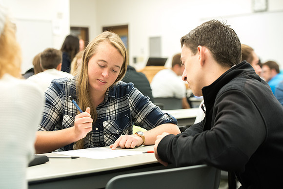 Todd Kelson teaches Biology students about Genetics and Molecular Biology.