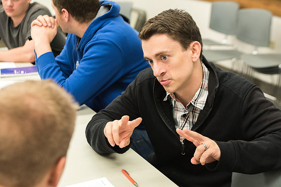 Todd Kelson teaches Biology students about Genetics and Molecular Biology.