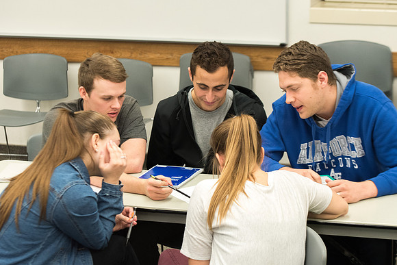 Todd Kelson teaches Biology students about Genetics and Molecular Biology.