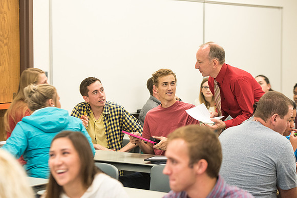 Todd Kelson teaches Biology students about Genetics and Molecular Biology.
