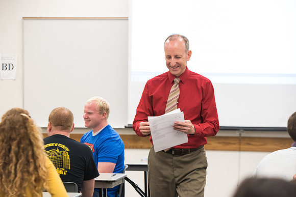 Todd Kelson teaches Biology students about Genetics and Molecular Biology.