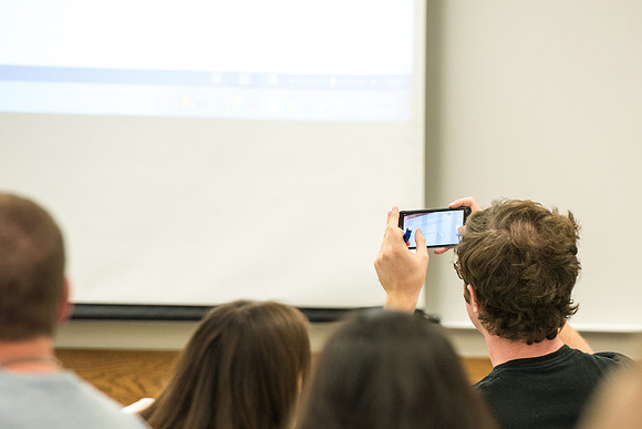 Todd Kelson teaches Biology students about Genetics and Molecular Biology.