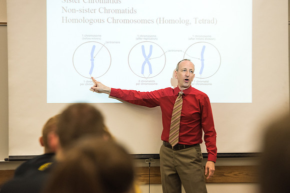 Todd Kelson teaches Biology students about Genetics and Molecular Biology.