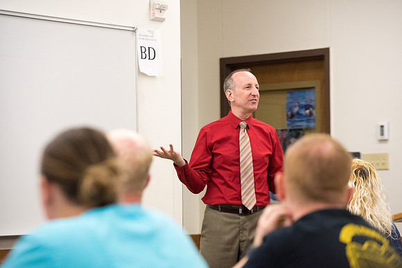 Todd Kelson teaches Biology students about Genetics and Molecular Biology.