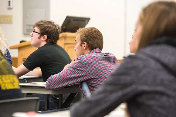 Todd Kelson teaches Biology students about Genetics and Molecular Biology.