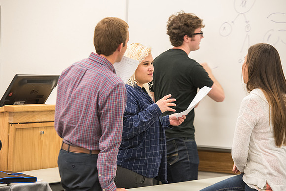 Todd Kelson teaches Biology students about Genetics and Molecular Biology.