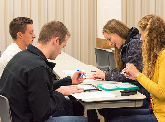 Todd Kelson teaches Biology students about Genetics and Molecular Biology.