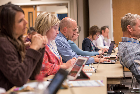 Faculty members come together in preparation of the new school year.