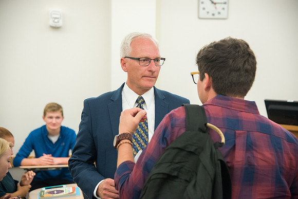 Greg Hazard helps new freshman learn how to be better learners in a Study Skills class.
