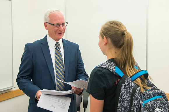 Greg Hazard helps new freshman learn how to be better learners in a Study Skills class.