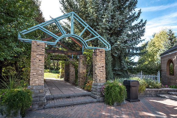 A pathway in the gardens on campus.