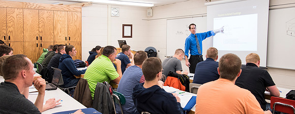 Students in a Civil Engineering class, Reinforced Concrete Design, are taught by Nathan Harris.