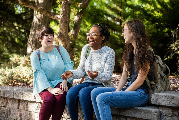 Students Abby Anderson, Miriam Akulu and Sariah Beasley studying and spending time in the gardens at BYUI.