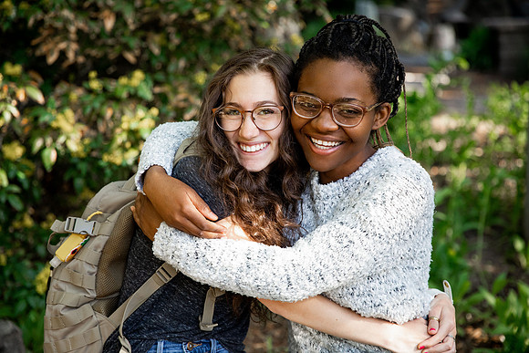Students Abby Anderson, Miriam Akulu and Sariah Beasley studying and spending time in the gardens at BYUI.