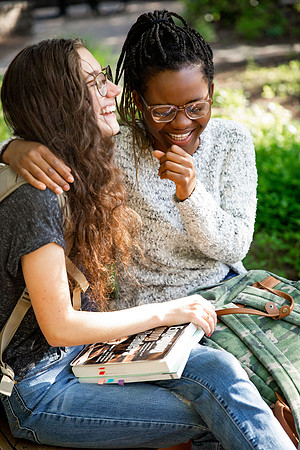 Students Abby Anderson, Miriam Akulu and Sariah Beasley studying and spending time in the gardens at BYUI.
