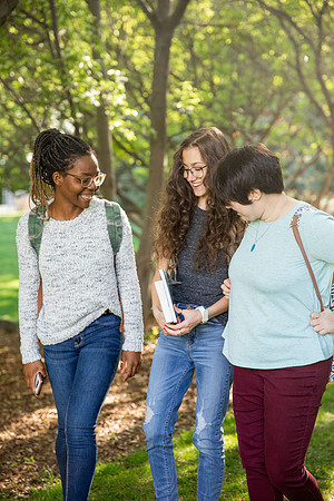 Students Abby Anderson, Miriam Akulu and Sariah Beasley studying and spending time in the gardens at BYUI.