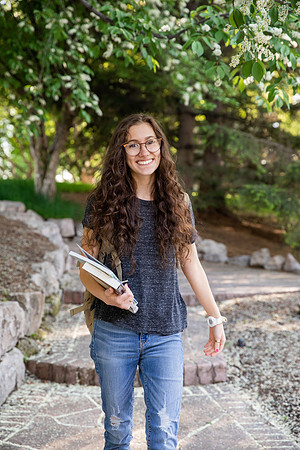 Students Abby Anderson, Miriam Akulu and Sariah Beasley studying and spending time in the gardens at BYUI.