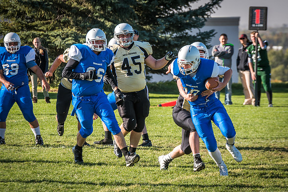 Students play a game of football on the upper-fields. Vikings vs Wolverines. 2017