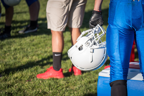 Students play a game of football on the upper-fields. Vikings vs Wolverines. 2017