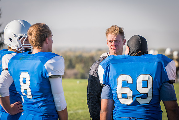 Students play a game of football on the upper-fields. Vikings vs Wolverines. 2017
