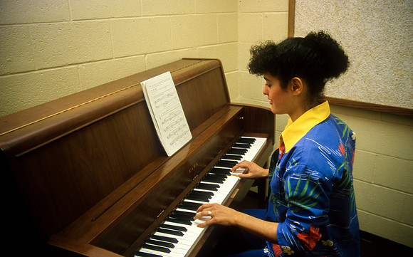 Student practicing piano