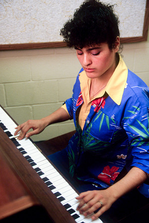Student practicing piano
