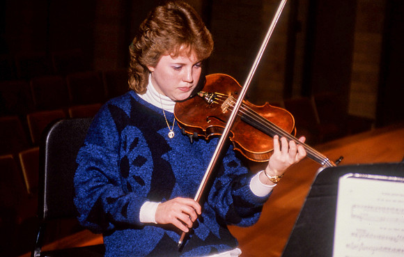 Student practicing violin