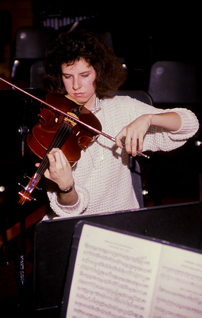 Student practicing violin