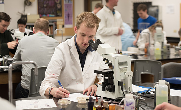 Students work in Brother Griffith's Microbiology Lab.