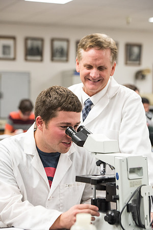 Students work in Brother Griffith's Microbiology Lab.