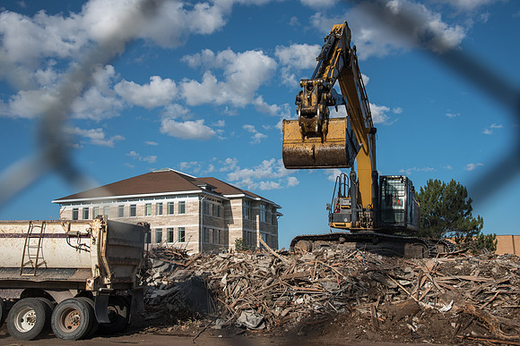 Remnants of the old Kirkham Building being hauled away.