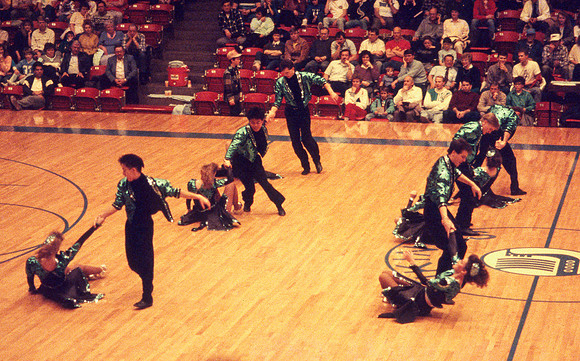 Ballroom dancers performing in gym. Feb 1990