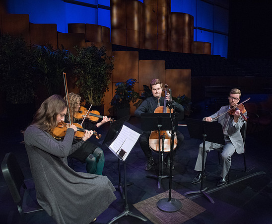 A String Quartet of Students plays for Devotional.