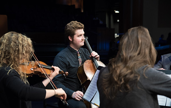 A String Quartet of Students plays for Devotional.