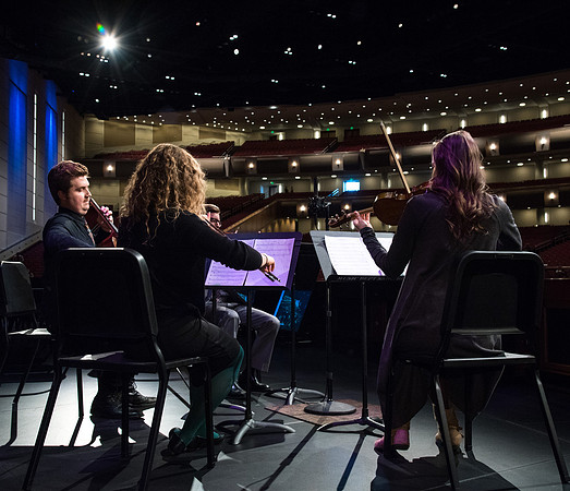 A String Quartet of Students plays for Devotional.