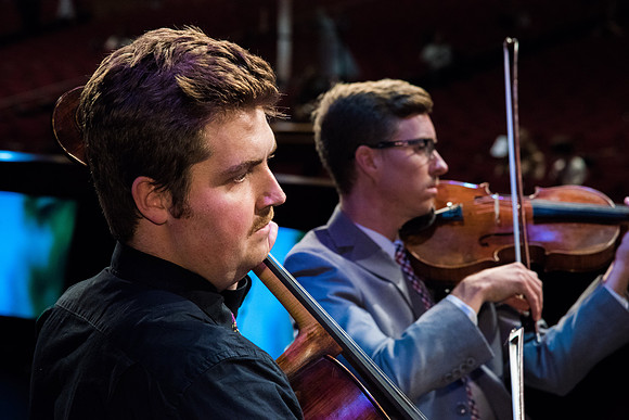 A String Quartet of Students plays for Devotional.