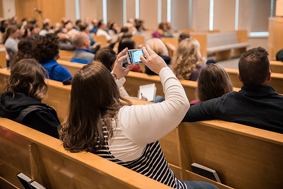 Parents of upcoming college students participate in a Conference session in the Taylor Chapel.