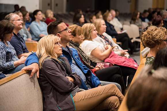Parents of upcoming college students participate in a Conference session in the Taylor Chapel.
