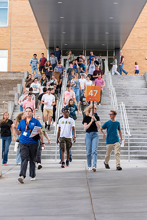 Freshman are guided by Student Mentors, around campus, to take a tour.