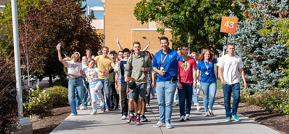 Freshman are guided by Student Mentors, around campus, to take a tour.