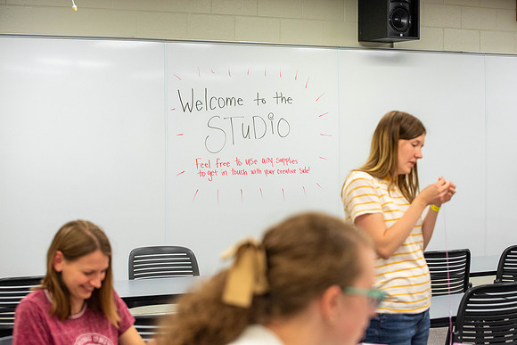Freshman and other students on campus at I-Night. They participate in many activities.